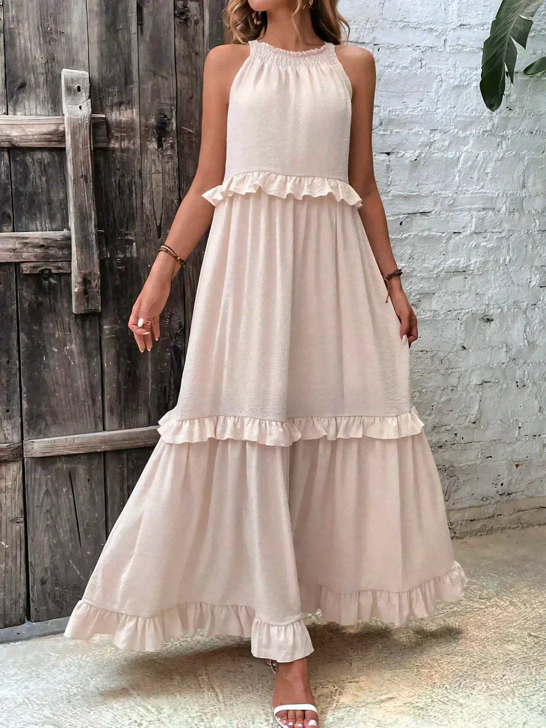 Gaja | Elegancka sukienka bez rękawów z falbankami